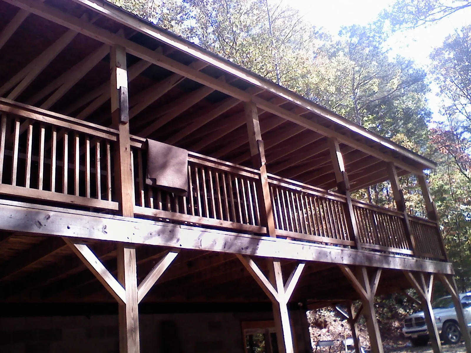Timber framing under a new elevated porch and deck — Roof Leak Repair in Newburgh by Roofing Brothers